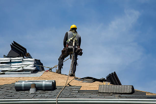 Roofing services in Tarrant County crew replacing shingles on Fort Worth home